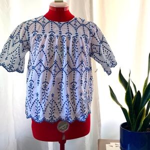 Rebellion- White and blue embroidered summer top. Scalloped sleeves and waist.